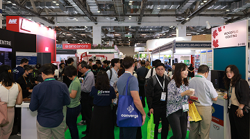 Visitors exploring exhibition booths showcasing the latest innovations in sustainability at IBEW.